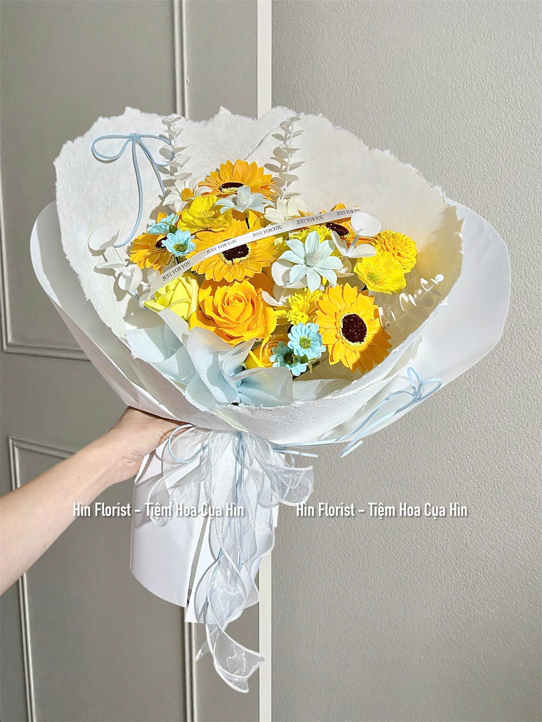 Bó hướng dương sáp mix xanh Bó hướng dương sáp mix xanh